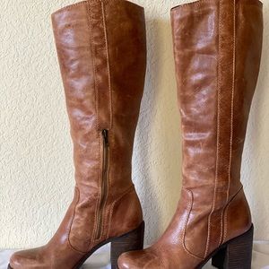 Steven by Steve Madden saddle tan boots.